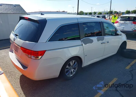 2014 Honda Odyssey Ex-L z USA, uszkodzony, nr VIN 5FNRL5H65EB091392
